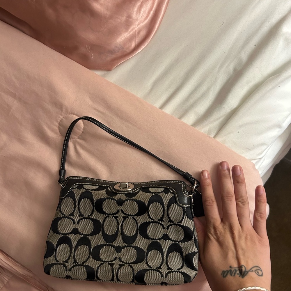 Coach Black and Tan Signature Clutch